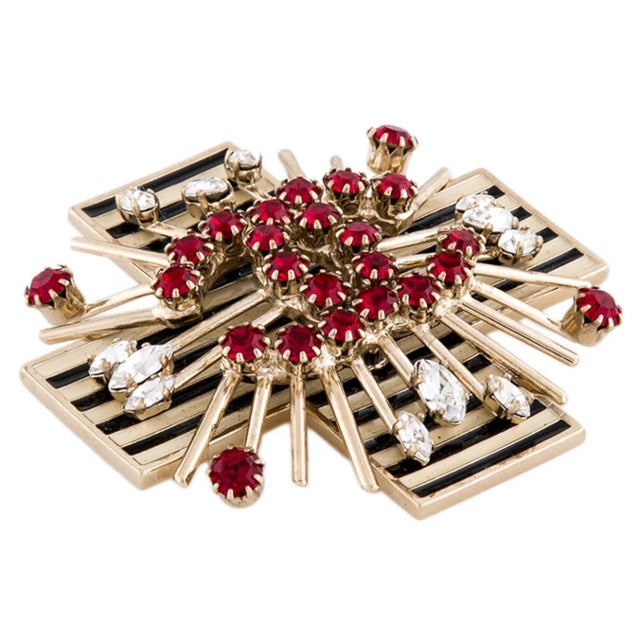 This rare design brooch pendant features the classic Maltese cross in a novel way and shows Karl Lagerfeld's ability to...