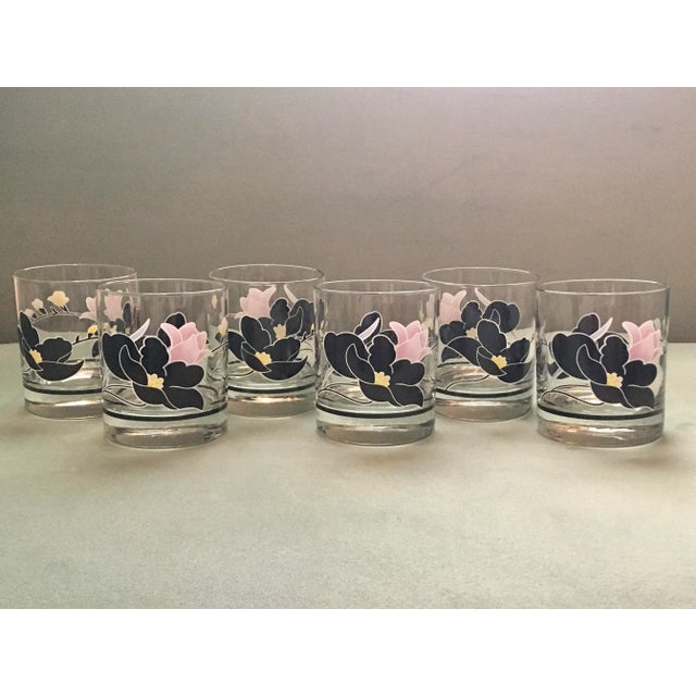 A beautiful French floral drinks set in excellent condition. Measurements: Pitcher- 8 inches tall and 7 inches wide at the...