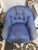This is a club chair. It also is able to swivel. It is made by Kravet furniture. It has a woven linen fabric in a blue...