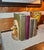 A beautiful pair of vintage deer head bookends, crafted from molded resin or composite and hand-painted with a faux wood...