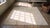 Textile 1930s White Cream Floral Antique Indian Cotton Agra Rug 6'4" X 7'10" Handknotted Wool Carpet For Sale - Image 7 of 9