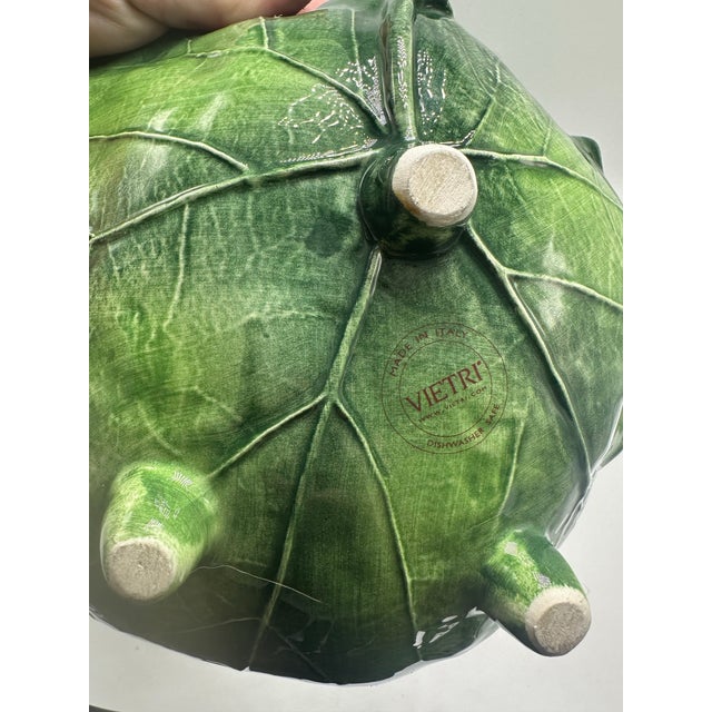 This set consists of two leaf-shaped ceramic serving bowls by VIETRI, a well-known Italian maker of handcrafted tableware...