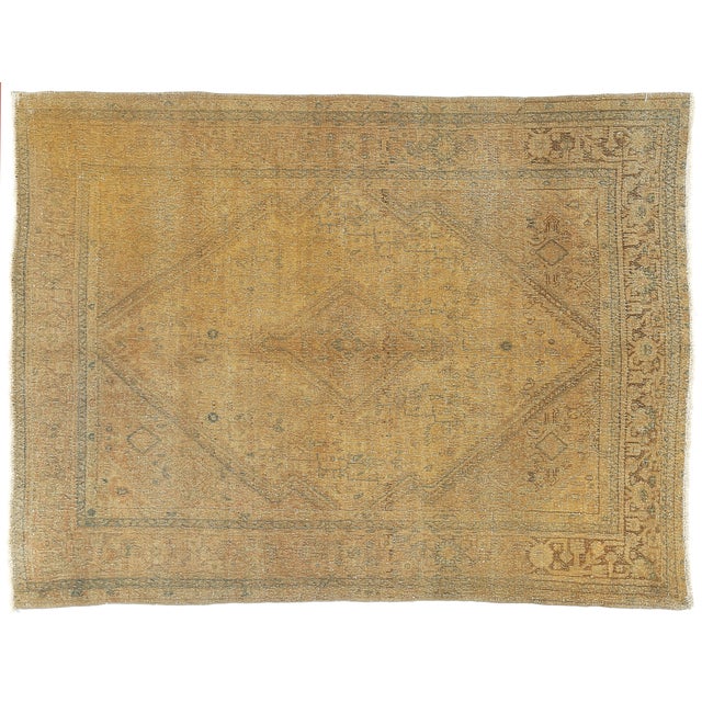 This vintage tribal rug features an exceptionally unusual and beautiful color palette of sun-washed gold, olive, and soft...