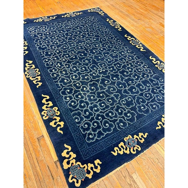 This antique Chinese Peking carpet is an exceptional representation of early 20th-century Asian weaving craftsmanship....
