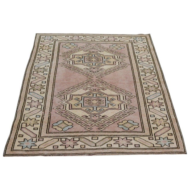 Hand-knotted with care using traditional rug-making techniques, this wool rug blends timeless craftsmanship with a modern...