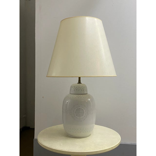 This gorgeous Celadon covered jar was made into a lamp by our parents in 1975. The Painted white pedestal table, with its...