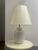 This gorgeous Celadon covered jar was made into a lamp by our parents in 1975. The Painted white pedestal table, with its...