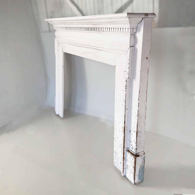 Antique English style wooden fireplace mantel with Neoclassical clean lines and understated dentil trim moulding Old...
