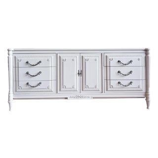 1970s French Provincial Dresser in Soft White With Carved Detailing and Cabinet Storage For Sale