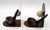 Pair of vintage golf themed bookends, American. Golf balls & driver heads (one a Top Flite by Spaulding) in brass bookend...