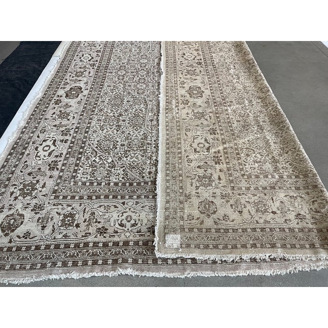 This Antique Distressed Mahal is an all wool Handmade and Hand knotted rug. It has an all over design from the 20th...