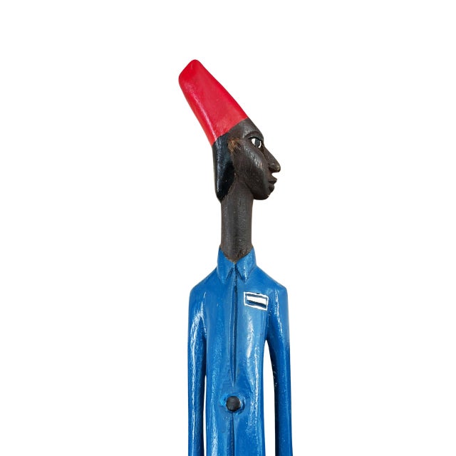 Vintage hand-painted wooden "Colon" figure carved from a single piece of wood, depicting a soldier in Western attire with...