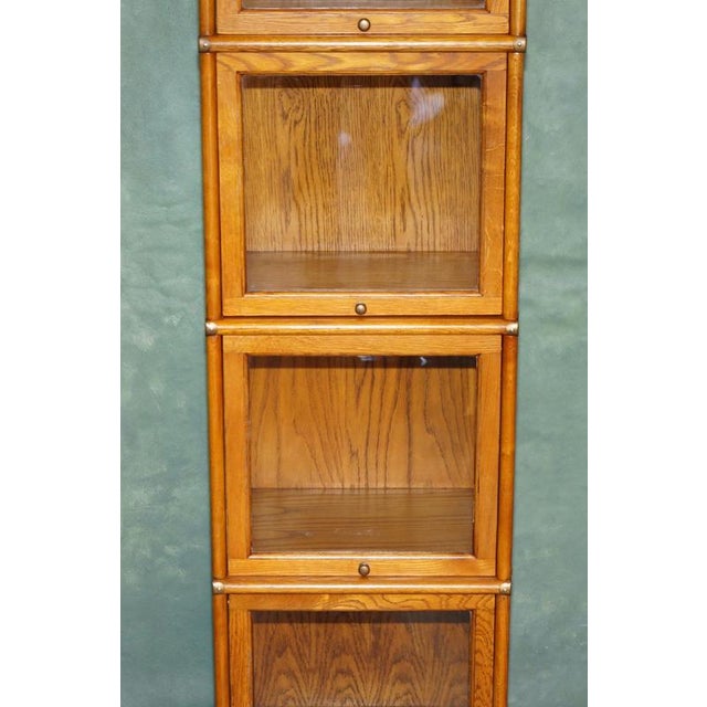 Antique Modular Honey Oak and Gilt Brass Stacking Bookcase with Glazed Retracting Doors For Sale - Image 4 of 18