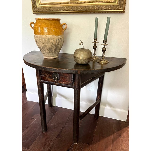 Handcrafted demi-lune table. Mortise and tenon construction. Single drawer with dovetail joints. Original hardware....