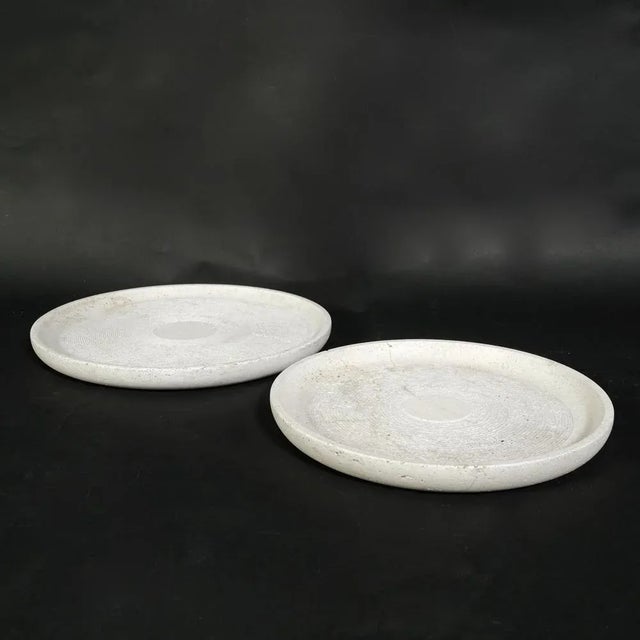 Interesting pair of circular trays, plates or centerpieces. Design Ants, as reported by the brand on the bottom of one of...
