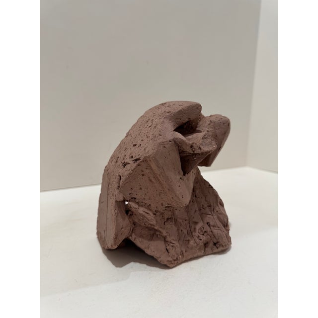 Larry Mohr (American, 1921-2013) abstract terracotta sculpture with organic form. This piece showcases Mohr's exploration...