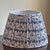 A large and very elegant vintage lampshade featuring a blue and antique white Jacobean floral chintz-style fabric with an...