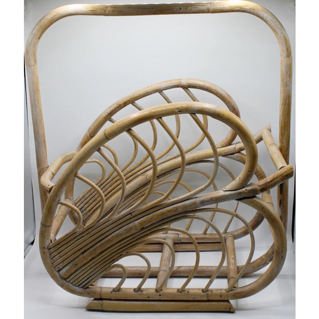 A large vintage rattan basket, with a lovely natural finish. Banana leaf design. Perfect for blankets, firewood, magazines...