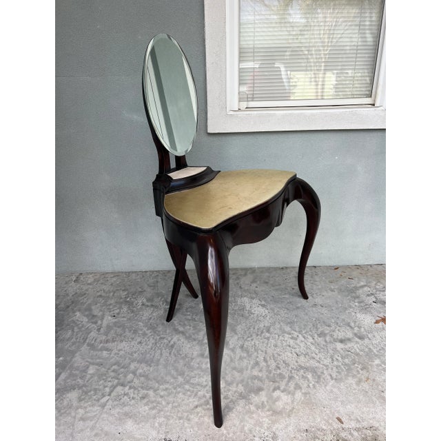 Custom made Christopher Guy “vanity Fair” dressing table in a Java Café Varnish and Black Sea Silver Leaf finish. Retails...