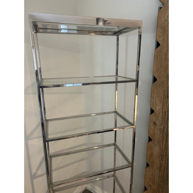 Mid century chrome and glass shelving by Mitchell Gold Bob Williams. This shelving is an modern and elegant. It can be...