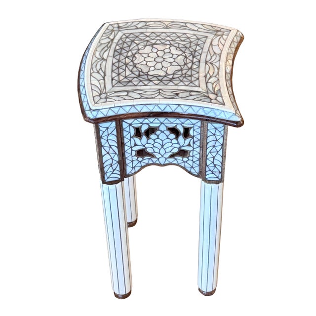 A beautifully handcrafted mother-of-pearl inlay side table featuring an intricate and delicate geometric design set into...