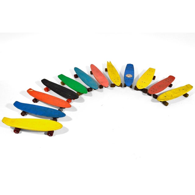 This colorful collection of twelve vintage skateboards from the 1970s includes examples by GT, the Scamp, the Sizzler, the...