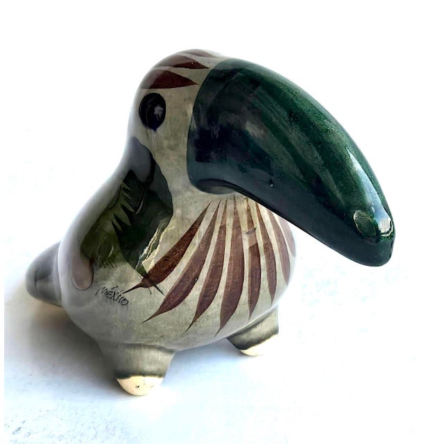 Offered is a vintage 1970s burnished ceramic toucan figurine from Tonalá in Jalisco, Mexico. The province is famed for its...