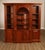 High Quality American Made Cherry Breakfront Bookcase with Shell-Carved Dome and Three Open Shelf Units Over Cupboard Storage