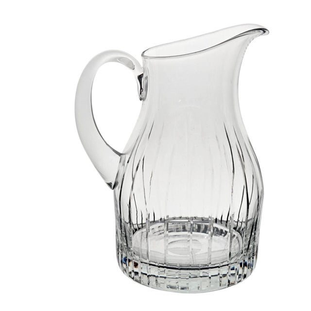 Block Crystal Symphony (BLCSYM) lead crystal water pitcher, produced in Poland between 1993 and 1997. This elegant pitcher...