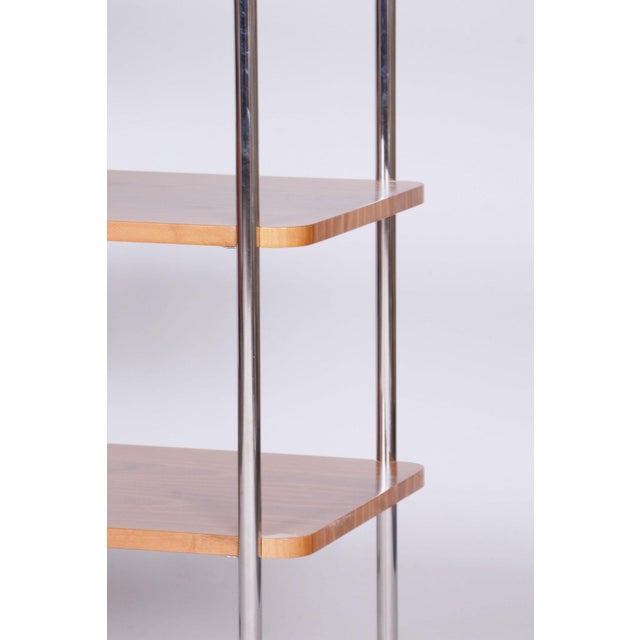 This elegant and cleanly shaped étagère in the spirit of Bauhaus functionalism dates from the 1940s in Czechoslovakia and...