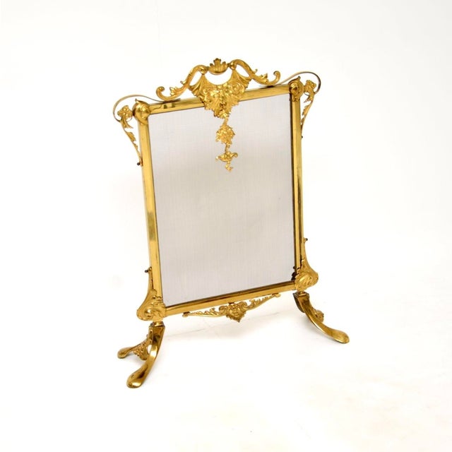 A beautiful antique French gilt metal fire screen, dating from around the 1900-1920 period. It is of extremely fine...