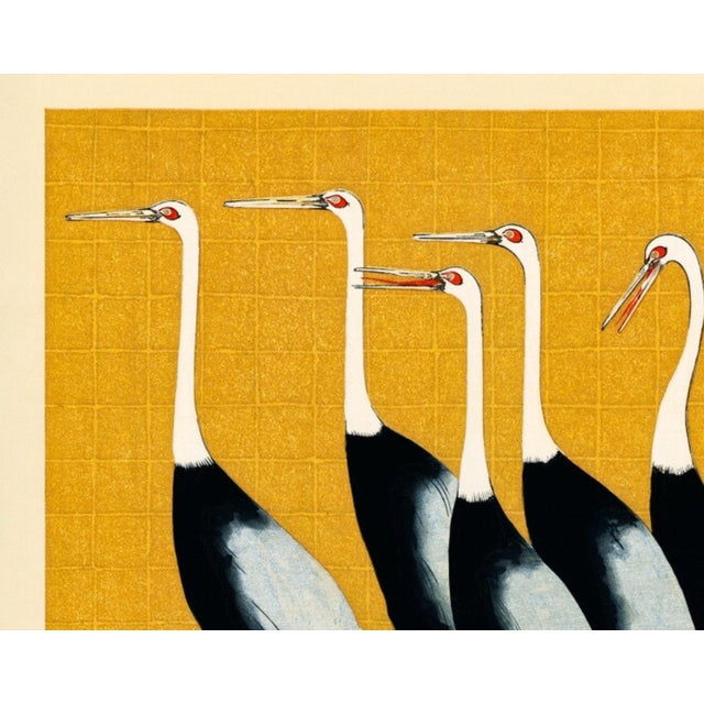 Vintage Japanese crane artwork reproduced from a historical source and refined for modern printing. The warm gold ground...