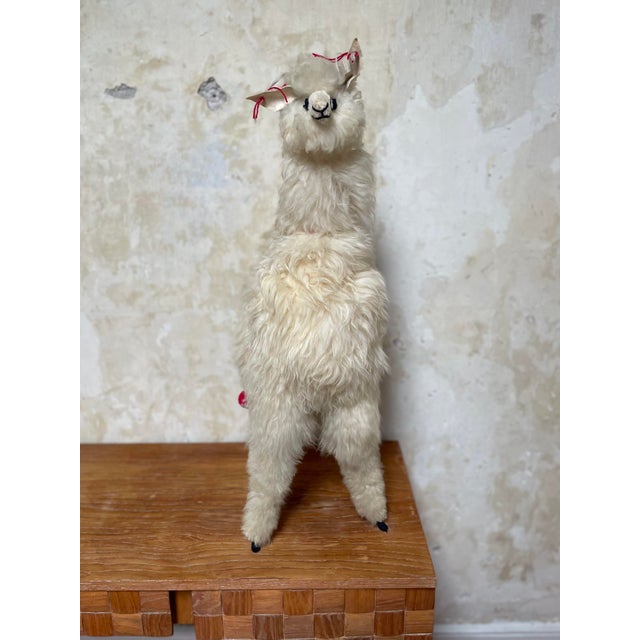 A 32" tall vintage Andean alpaca (or llama) fur toy or sculpture with the most wonderful little face, ears and tassels....