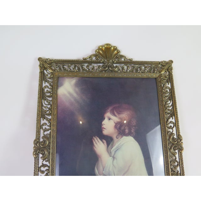 The decorative photograph came with the original frame. You can of course use the frame for you own photographic display....