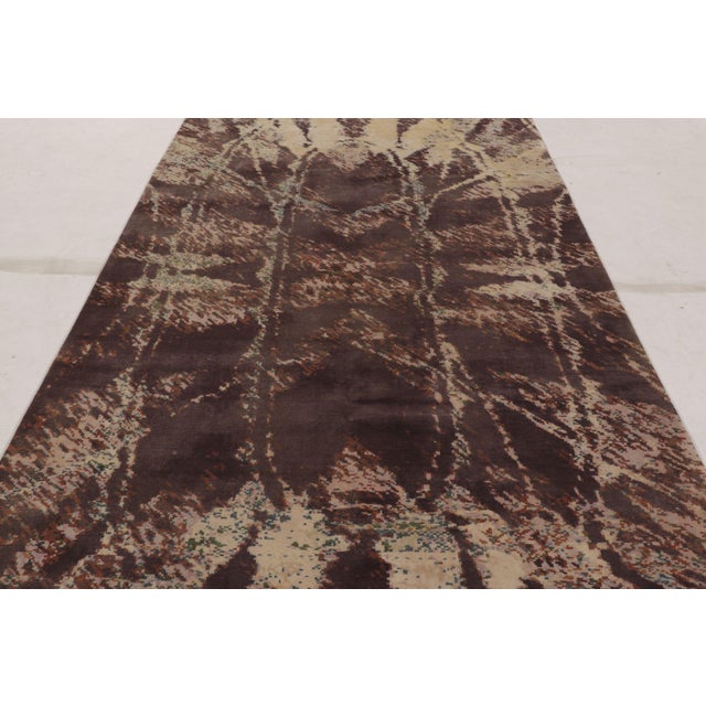 Made with hand-knotted wool and silk, this 6x14 contemporary gallery runner rug is a bold new addition to the Rug &...