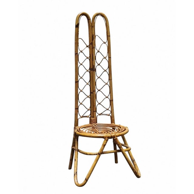 Rare original chair from the 1960s with double high backrest in curved bamboo, beautiful design, and comfortable seat....