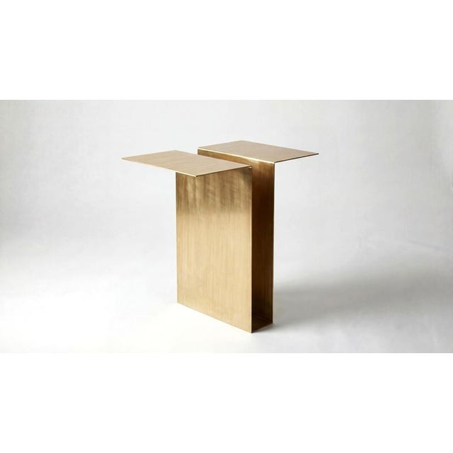 Balance side table, brass and raw, by auste ost dimensions: w 50 x d 30 x h 50 cm materials: brass, raw with brushed...