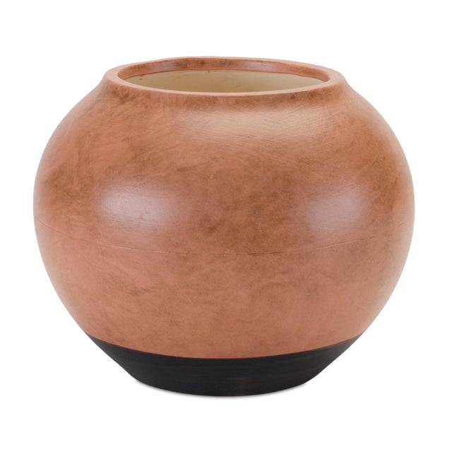 Bring refined charm to your home with this Two-Tone Ceramic Vase. Featuring a timeless urn silhouette and a harmonious...