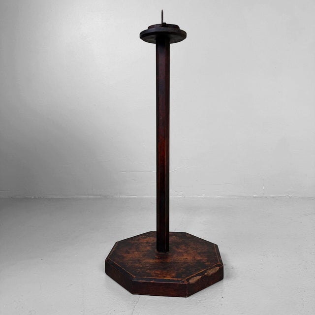 A characterful Japanese wooden shokudai, or traditional candle stand, with an octagonal base, faceted central pillar and...