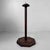 A characterful Japanese wooden shokudai, or traditional candle stand, with an octagonal base, faceted central pillar and...