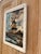 A charming vintage oil painting featuring a classic windmill set against a dramatic, moody sky. Beautifully framed in an...