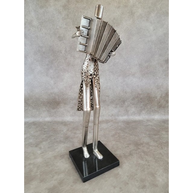 Vintage Metal Art Organ Player Figurative Sculpture Statue on Black Base Circa 20th Century Dimensions: 34.75"H x 9.3"W x...