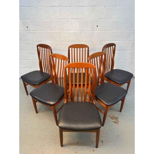 Elegant set of six mid-century modern dining chairs by Benny Linden, showcasing the timeless appeal of Danish-inspired...