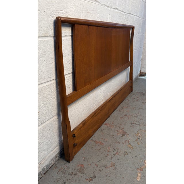 Transform your bedroom with this Mid-Century Modern Walnut Headboard, a striking example of timeless design and...