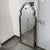 Design Plus Gallery presents a Lunel Arch Mirror by Jim Parsons from Uttermost. The mirror showcases an elongated...