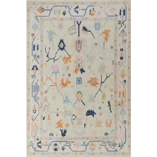 Navy Blue, Light Pink and baby Blue with pops of Orange and green colorful handknotted modern oushak rug As all of our...