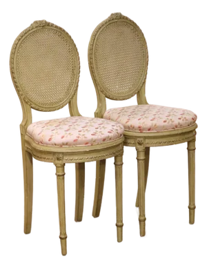 Pair of Early 20th Century French Louis XVI Painted Cane Side Chairs