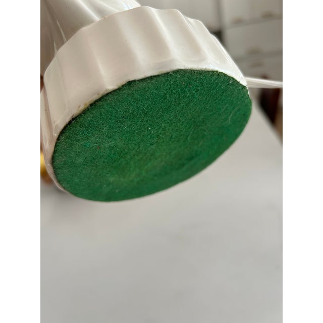 Beautiful MCM Acanthus leaf lamp in excellence vintage condition. The lamp has original harp and finial.