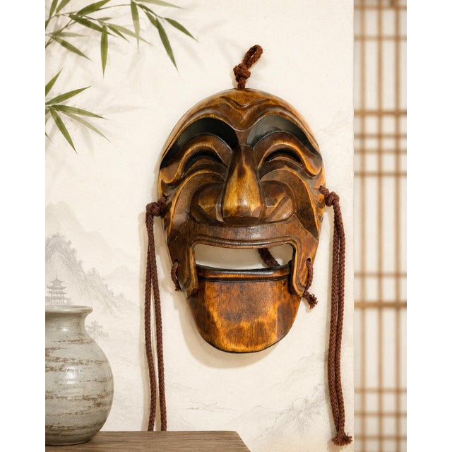 Expressive vintage Korean carved wood mask depicting Yangban, the aristocrat or nobleman character associated with Korea’s...