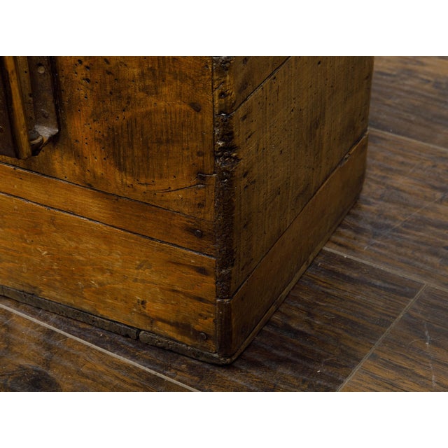 A French pine or oak tantalus wine box from the 19th century with metal lock and two handles. This French 19th-century...